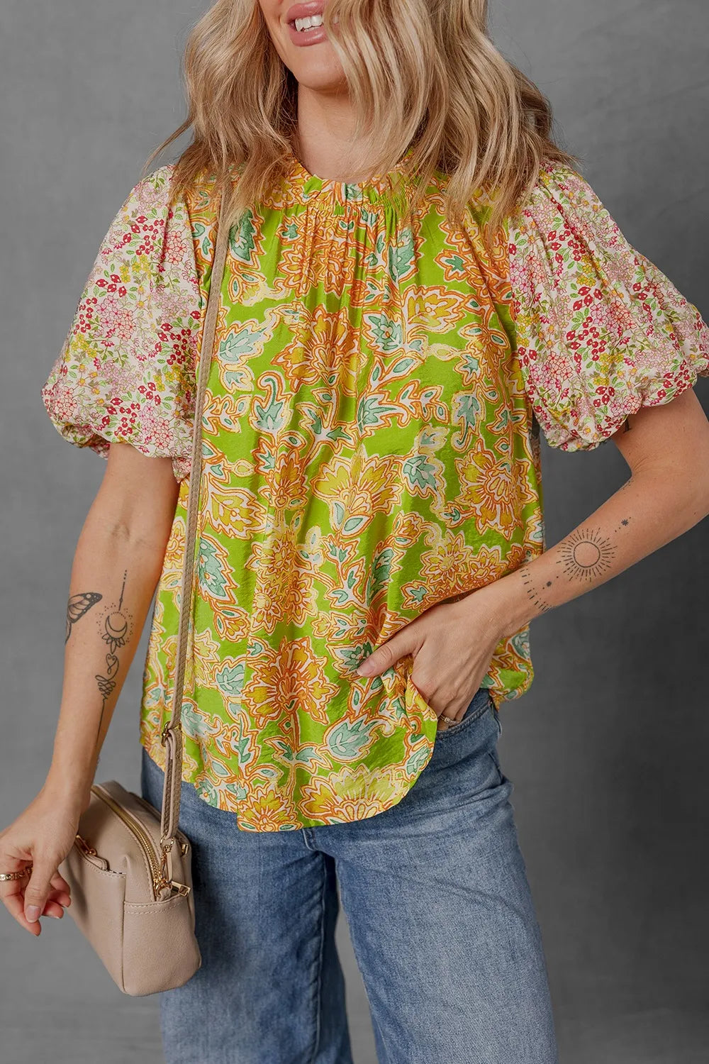 Multicolour printed blouse with contrast bubble sleeve and patchwork design.
