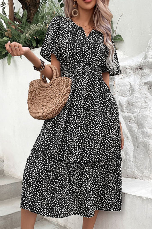 Perfee leopard print midi dress with short sleeves.