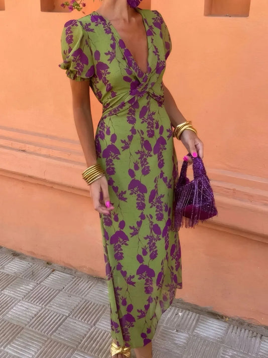 Printed midi dress with plunge neckline and short sleeves.